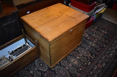 Lot 1477 - A large pine bedding chest on plinth base,...