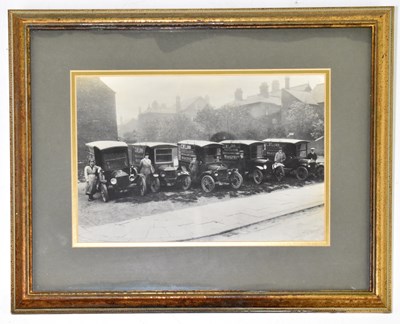 Lot 882 - A black and white photograph of Star Bakery,...