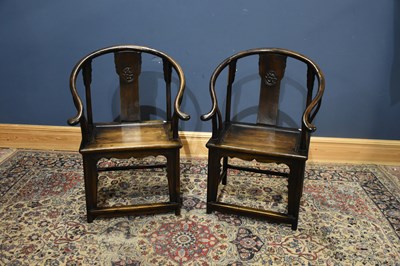 Lot 235 - A pair of reproduction Chinese elm horseshoe...