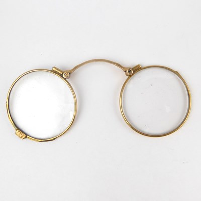 Lot 193 - A pair of 9ct gold collapsible spectacles...