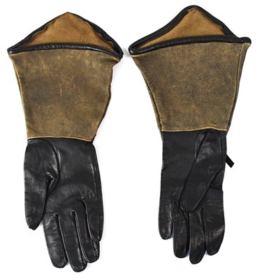 Lot 133 - CHER; a pair of brown and black leather gloves...