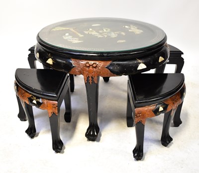 Lot 404 - A Chinese black lacquered circular table with...