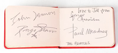 Lot 158 - THE BEATLES; an autograph book containing the...