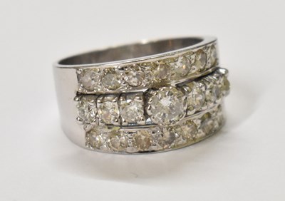 Lot 778 - A white metal diamond set ring, the central...