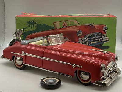 Lot 107 - DISTLER; a tin plate convertible car with red...