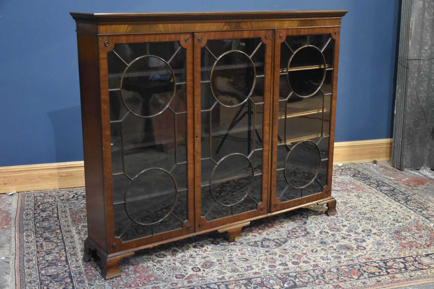 Lot 19 - An early 20th century mahogany bookcase, with...