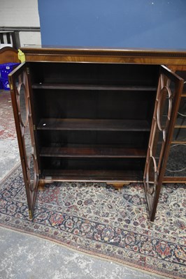 Lot 19 - An early 20th century mahogany bookcase, with...