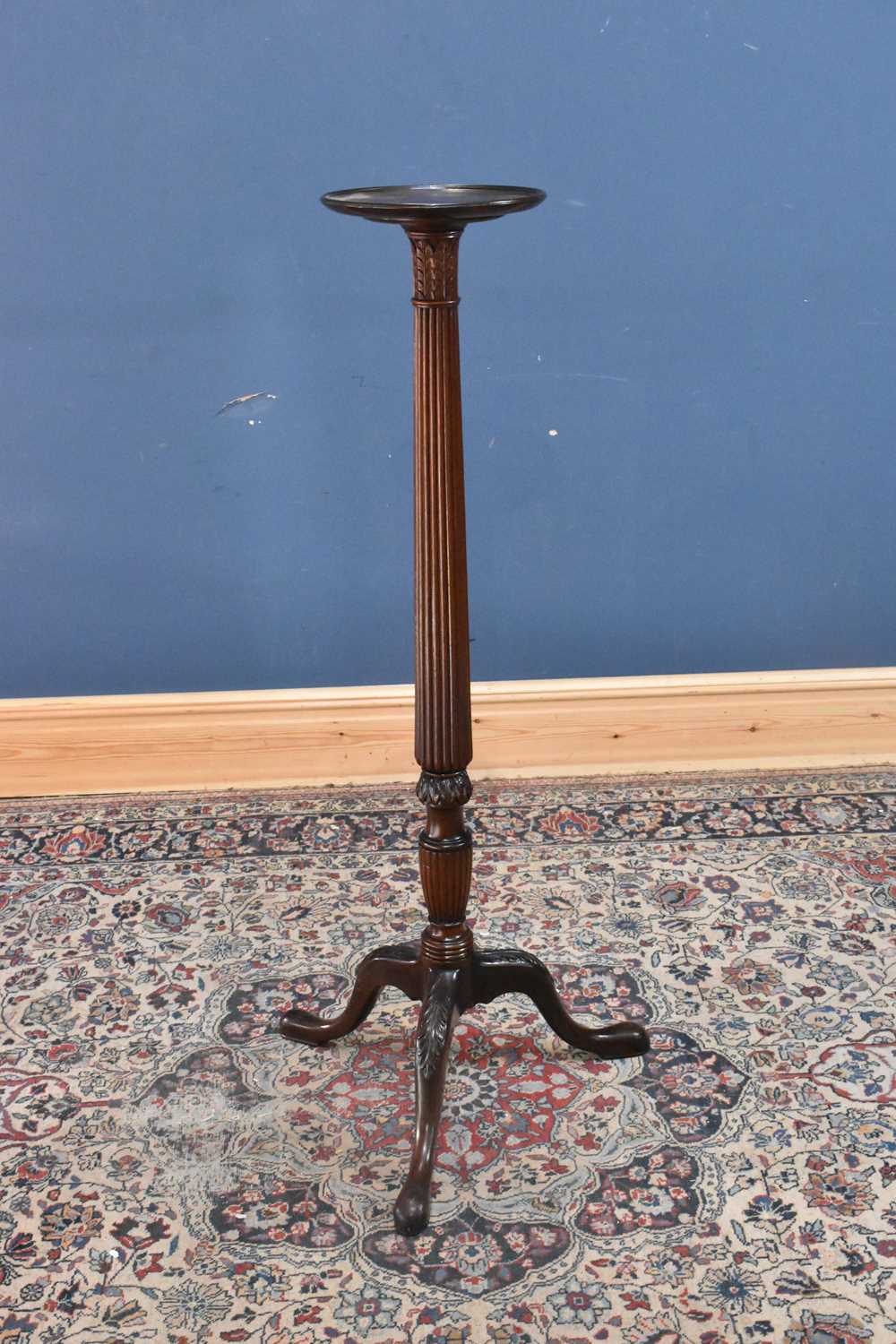 Lot 83 - An Edwardian carved mahogany jardiniere stand,...
