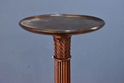 Lot 83 - An Edwardian carved mahogany jardiniere stand,...
