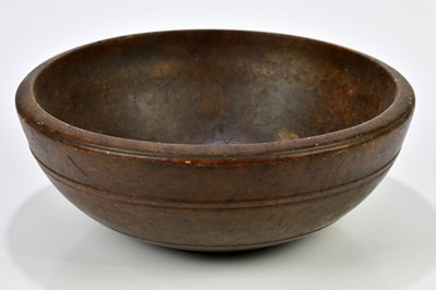 Lot 1077 - A 19th century turned sycamore bowl, diameter...