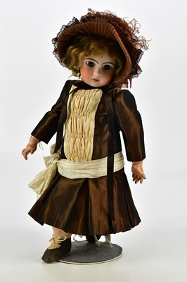 Lot 11 - ATTRIBUTED TO JUMEAU; a bisque headed doll,...