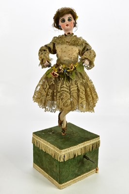 Lot 5 - SFBJ; a French bisque headed automaton dancing...