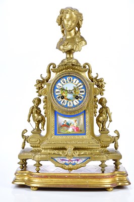 Lot 2081 - A 19th century gilt metal mantel clock, with...