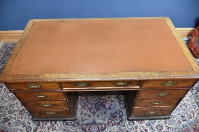 Lot 10 - A 19th century teak campaign kneehole desk,...