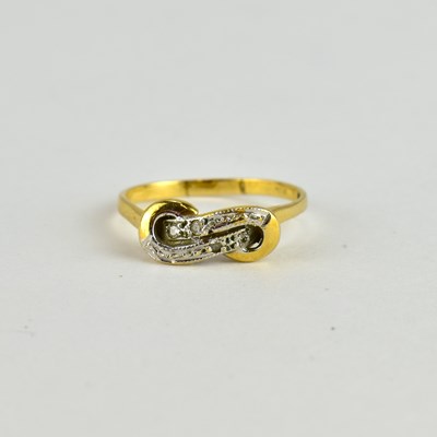 Lot 759 - A 9ct gold ring set with tiny diamonds to the...