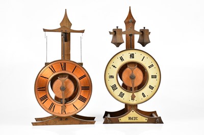 Lot 2126 - BUCO; two Swiss Baumann mantel clocks, the...