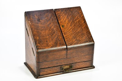 Lot 1084 - A 1920s oak stationery cabinet, 27 x 29cm, a...