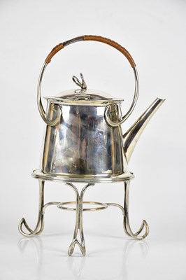 Lot 1240 - An Arts and Crafts spirit kettle on stand with...