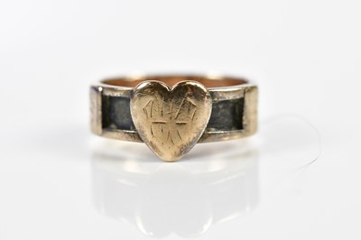 Lot 216 - A 9ct yellow gold mourning ring with heart...