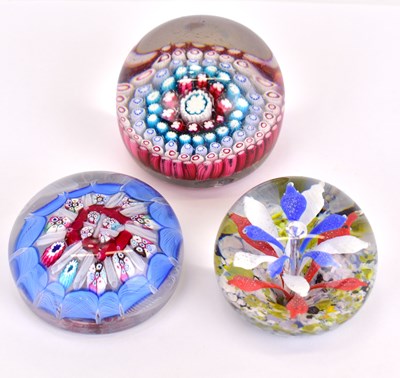 Lot 350 - Three vintage glass paperweights comprising a...