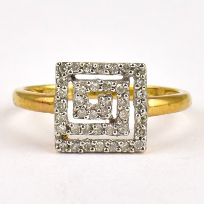 Lot 753 - A 9ct gold dress ring with Greek Key cluster...