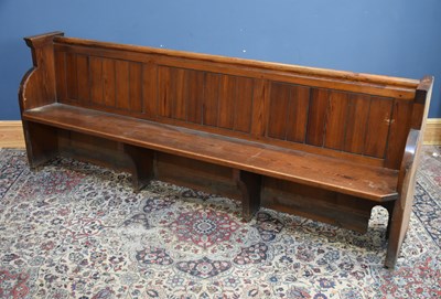 Lot 281 - A 19th century pitch pine pew, height 91cm,...