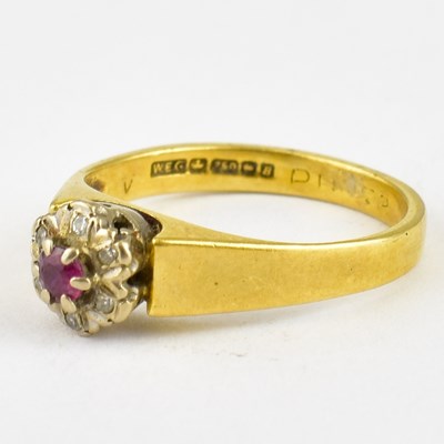 Lot 738 - A vintage 18ct gold ruby and diamond cluster...