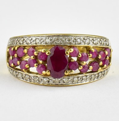 Lot 763 - A 9ct gold ruby and diamond cluster dress ring,...