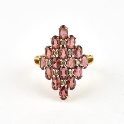 Lot 750 - A 9ct gold contemporary dress ring, cluster...