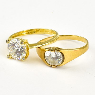 Lot 793 - Two 9ct gold white stone solitaire rings,...