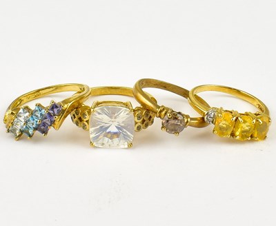 Lot 795 - Four 9ct gold gem set dress rings, sizes Q, N,...