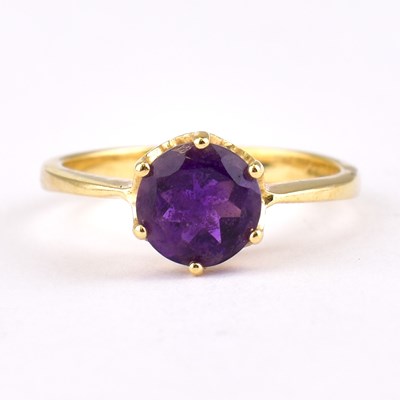 Lot 747 - A 14ct gold single claw set amethyst ring,...