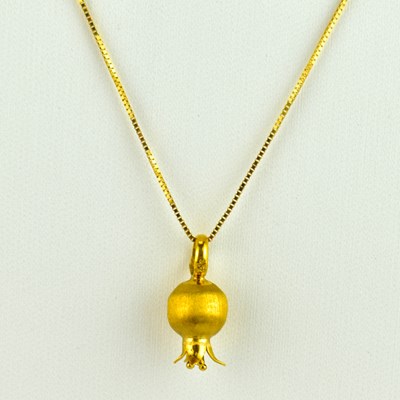 Lot 831 - An 18ct gold pineapple-shaped pendant on a...