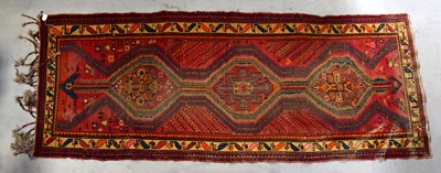 Lot 100 - A Kurdish Sumac hand-knotted rug, 290 x 100cm.