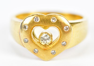 Lot 74 - A yellow metal diamond heart shaped ring with '...