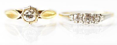 Lot 728 - An 18ct yellow gold ring set with a diamond,...