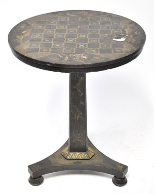 Lot 67 - A 19th century japanned circular tilt-top...