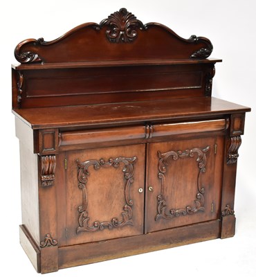 Lot 62 - A Victorian mahogany chiffonier with carved...