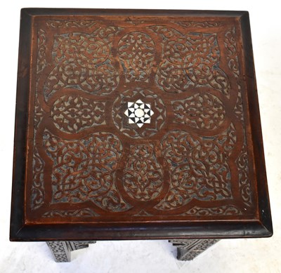 Lot 45 - An Indian carved side table with inlaid mother...