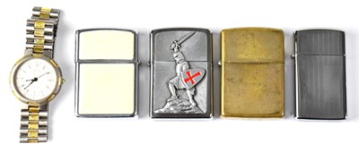 Lot 204 - Four Zippo cigarette lighters, one bearing an...