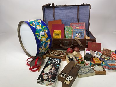 Lot 34 - A vintage suticase full of games including...
