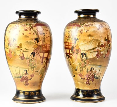 Lot 419 - A pair of Oriental gilt-heightened vases...