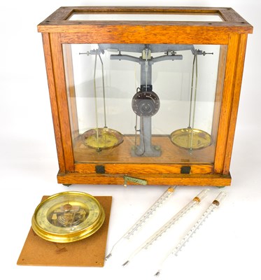 Lot 364 - A cased set of school scientific balance...