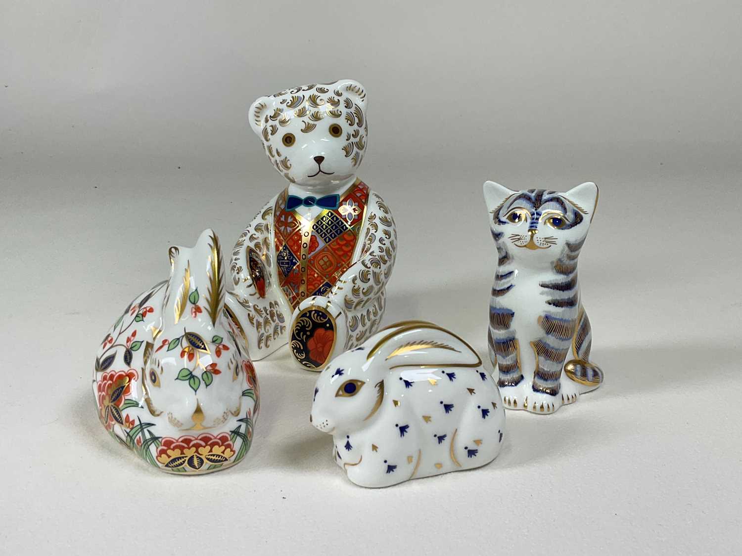 Lot 209 - ROYAL CROWN DERBY; four boxed paperweights...