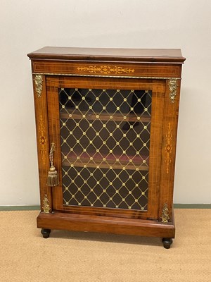 Lot 648 - An Edwardian pier cabinet with velvet lined...