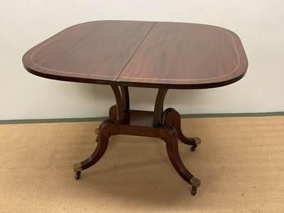 Lot 676 - An early 20th century folding card table...