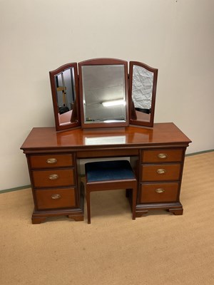 Lot 708 - STAG; dressing table with three section...