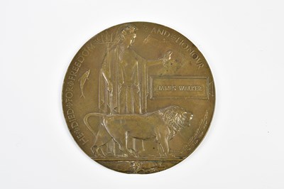 Lot 1561 - A WWI bronze memorial plaque, named to James...