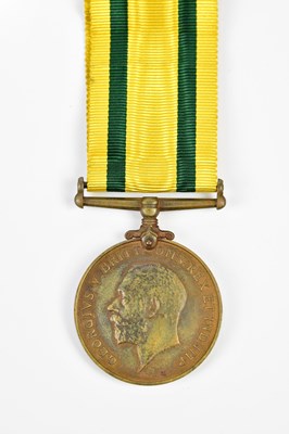 Lot 1552 - A WWI Territorial Force War Medal, named to...