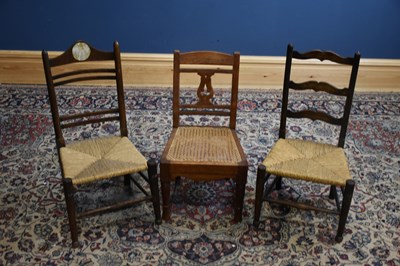 Lot 137 - Two rush seated child's chairs and a similar...